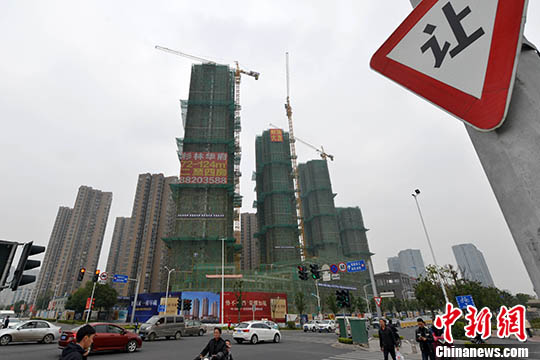 資料圖:一處商品房在建中。 <a target='_blank' href='http://www.chinanews.com/'>中新社</a>記者 呂明 攝 資料圖:一處商品房在建中。 <a target='_blank' href='http://www.chinanews.com/'>中新社</a>記者 呂明 攝