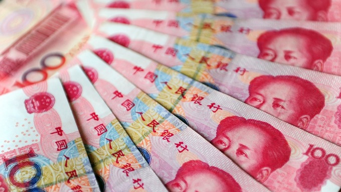 央行重收外匯風險準備金人民幣中間價下調191點